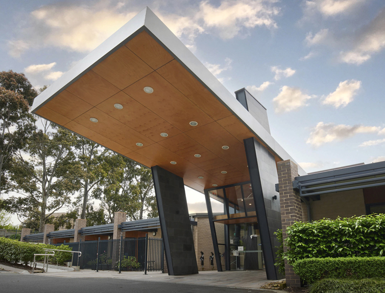 Outside of front of building, modern facade.